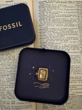 Fossil gold-tone rectangular ring with cream dial detail